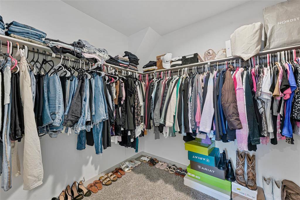 Primary Closet with Plenty of Space & Convenient Shelving for Storage