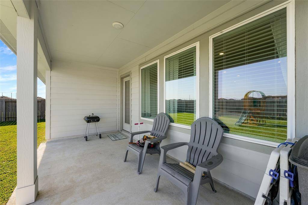 Backyard Covered Porch! Enjoy time outside without being burned by the sun!