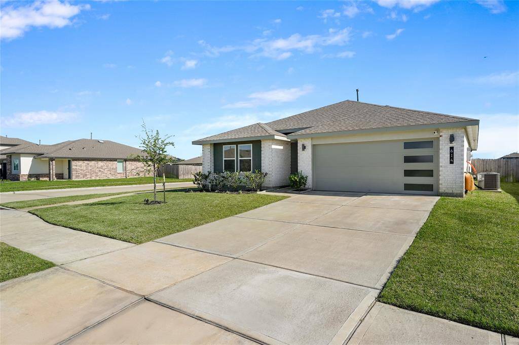 Spacious Driveway with Plenty of Vehicle Space