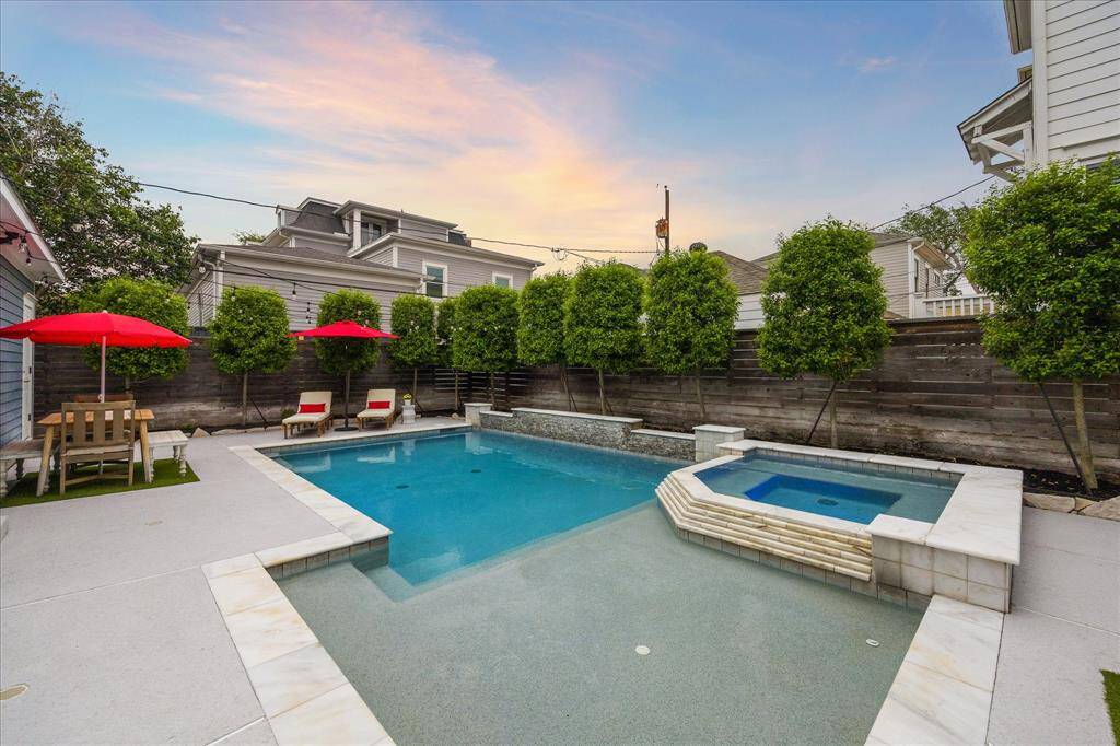 A surprise to everyone that has visited the homeowners over the years, this backyard space is an oasis. The heated pool/hot tub is complimented by the manicured landscaping which provides a relaxing aesthetic.