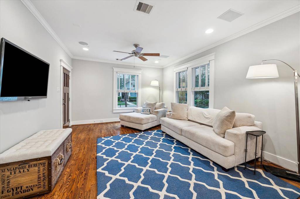 This home enjoys an abundance of natural light.  An often overlooked design feature are the clean walls with the outlets in the baseboards.  It really makes for a much cleaner look to each wall.