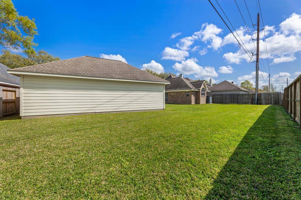 To the left of the entry is your study. Spacious with two points of entry it has a full closet and can double as a fourth bedroom.