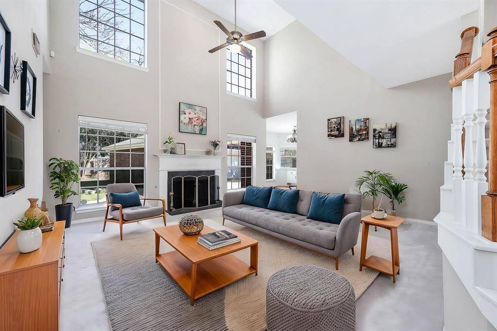 This is a virtually staged photo with furniture in the living room for demonstration purpose.