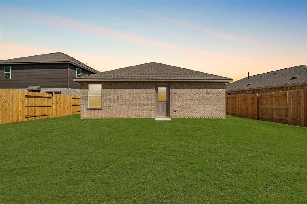 Welcome to your new backyard! Check out all of that wonderful green space for the kids and pets to run around in.
