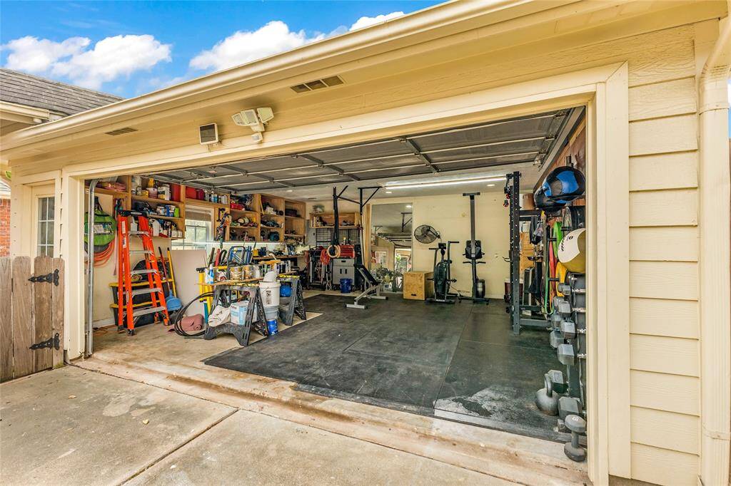 Shows Two Car Space Garage And Extra Storage Area