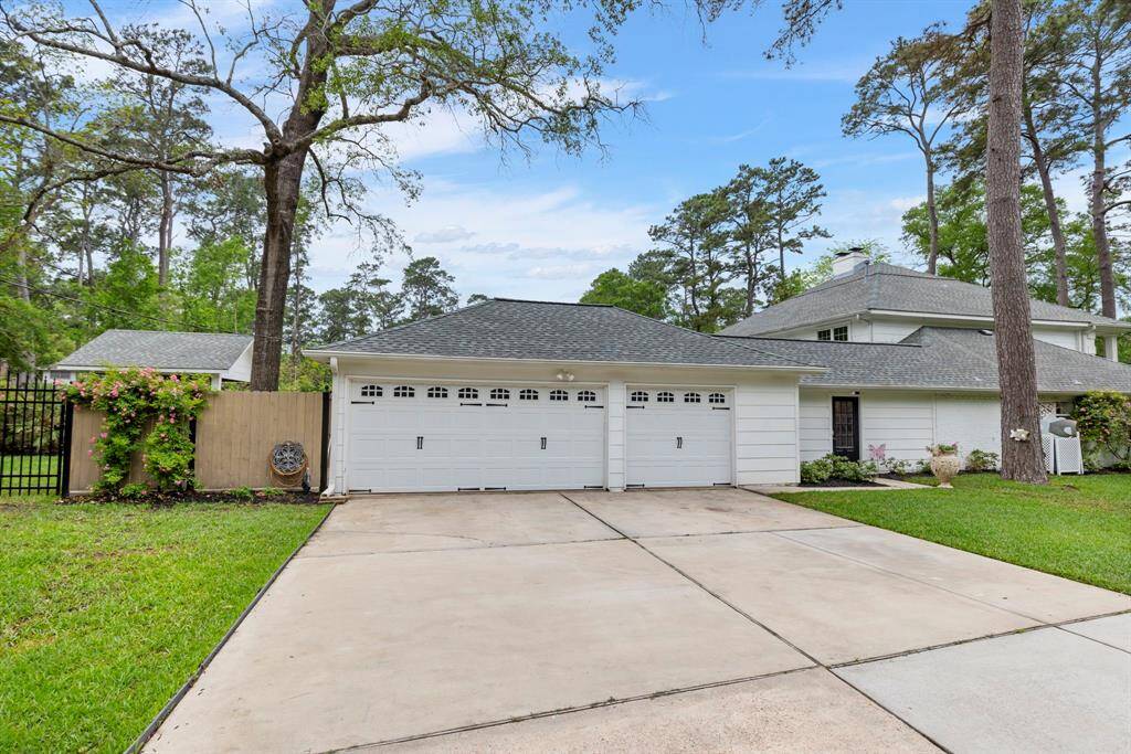 The attached 3-car garage features a side entrance, offering easy access and additional privacy.