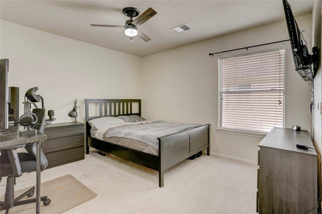 One of the secondary guest bedrooms.