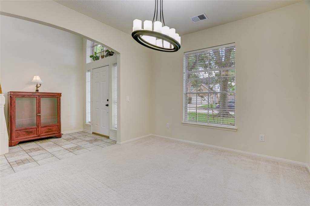 Formal dining room could be a study, craft or play area.