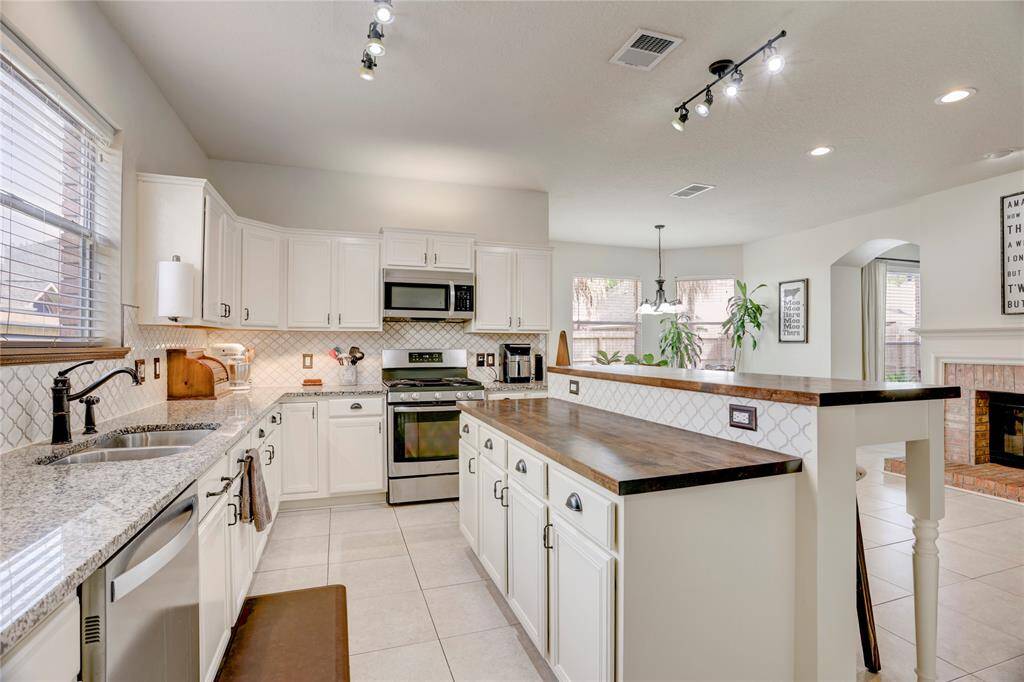 Plenty of counter and cabinet space in this updated kitchen!