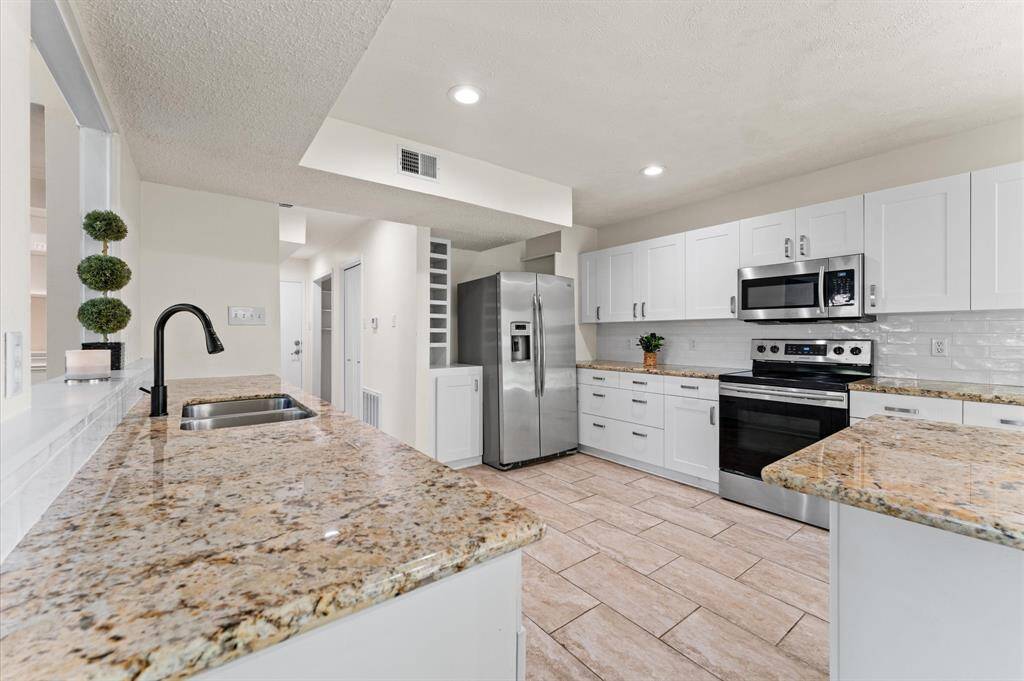 Convenient kitchen island with ample storage and counter space