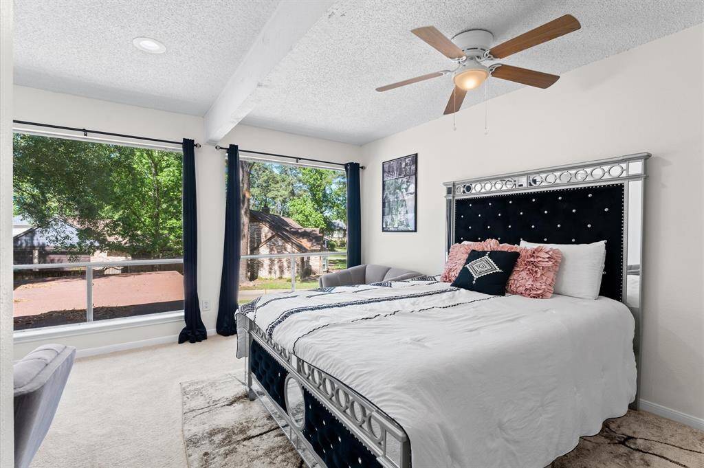Another view. Tranquil bedroom offers a personal retreat.....look at the natural lights coming in.