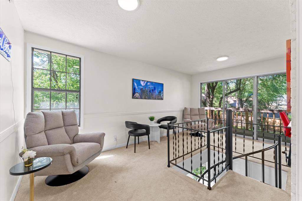Walk-out to the balcony from the convenient, beautifully finished upstairs lounge!