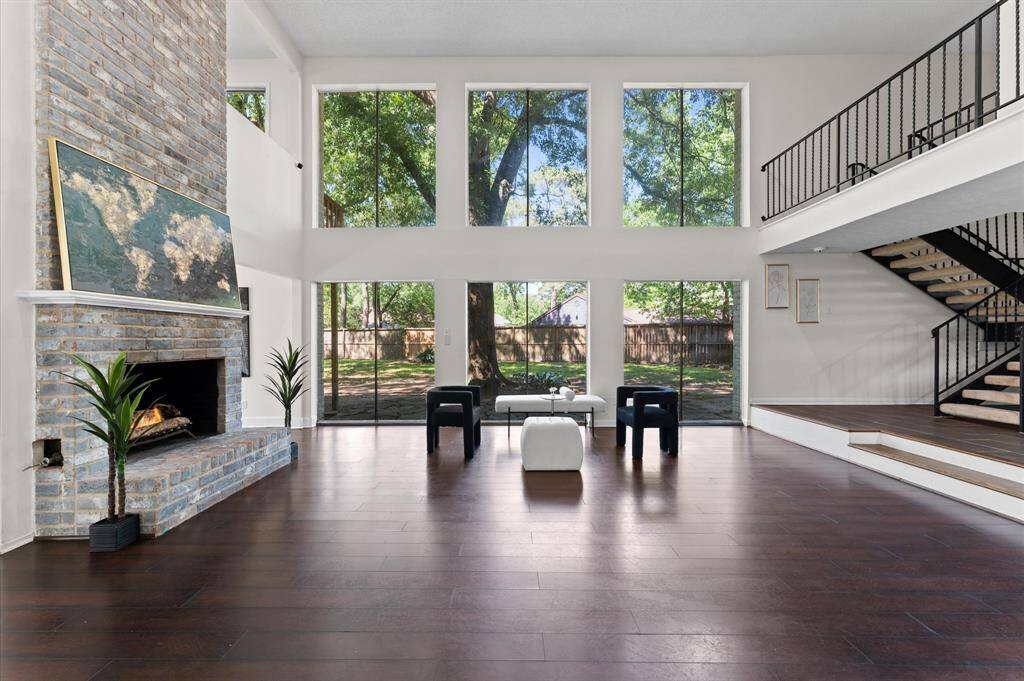 The glass window-wall brings the outdoors inside. The glass gives it a class