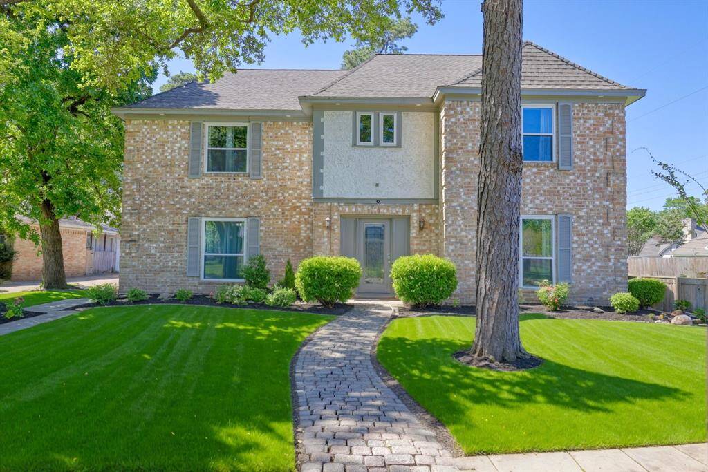 Welcome home to 6814 Chancellor Drive – featuring great curb appeal, a spacious front yard, and a warm, inviting exterior.