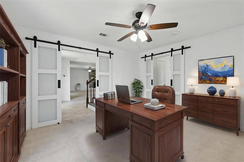 This photo has been virtually staged to showcase the room’s full potential and versatility.Imagine the possibilities—whether as a cozy sitting area, a productive home office, or a stylish guest space, this room is ready to suit your needs.
