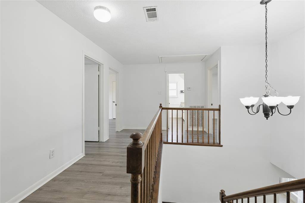 As you make your way to the second level, you’ll discover four charming bedrooms, each ready to become your personal retreat.