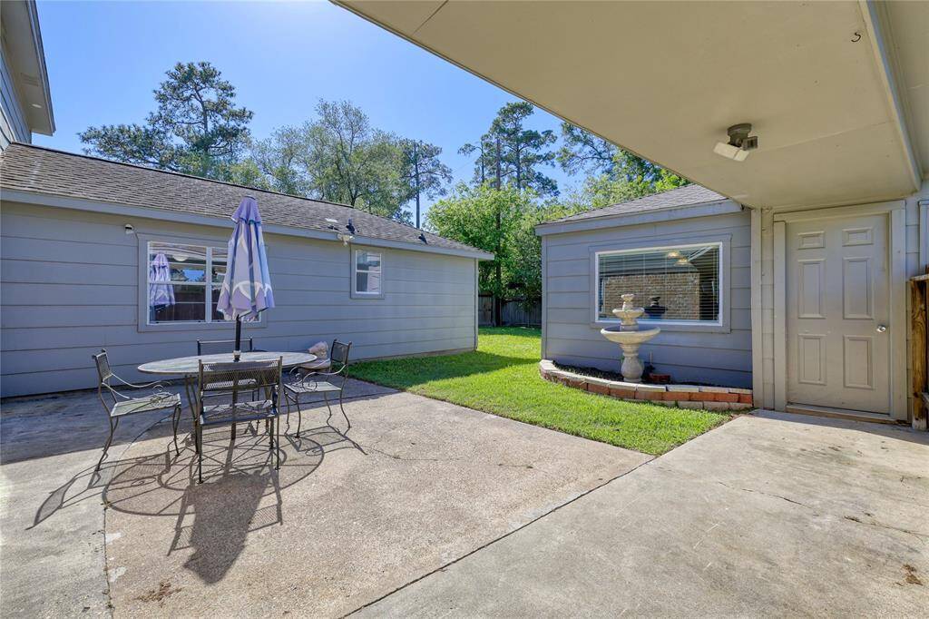 Check out this patio area, offering endless possibilities for entertaining guests!Whether you're grilling up a delicious meal, enjoying a cozy fire, or roasting s'mores under the stars, this outdoor space is perfect for making lasting memories.
