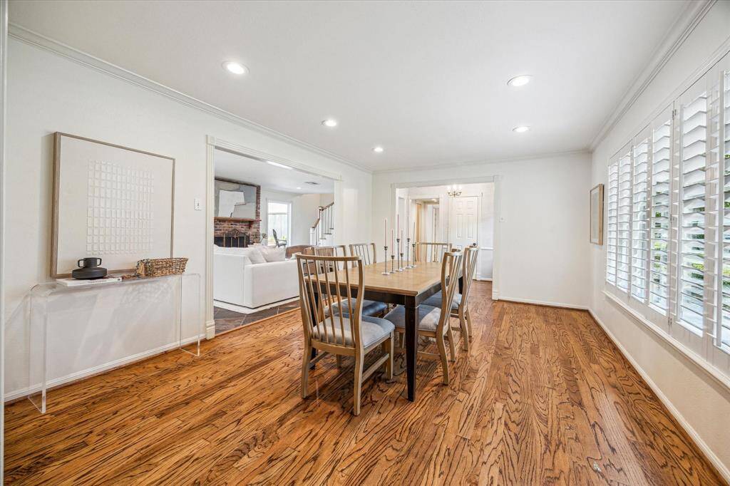 Here's another view highlighting the grandeur of the dining room, which gracefully opens to the family room—perfect for entertaining.