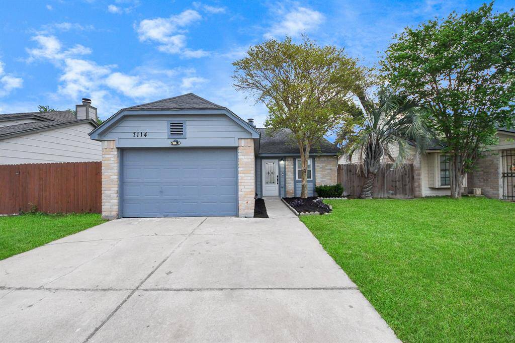 Charming single-story home with a neatly manicured front yard, two-car garage, and inviting entryway. Perfect for comfortable living in a friendly neighborhood.