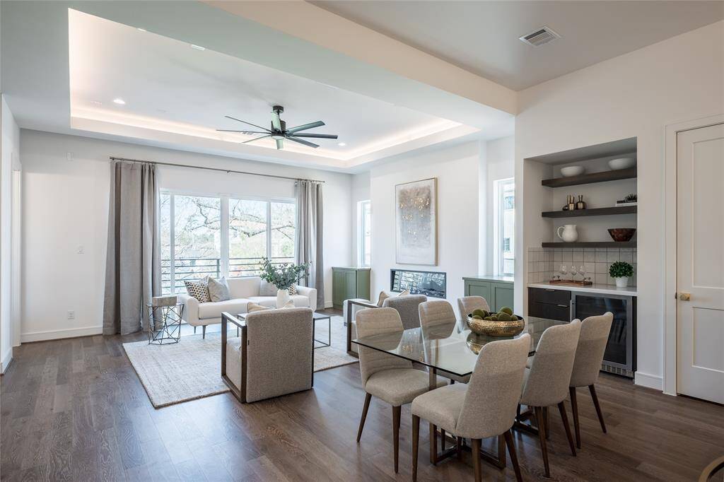 Architectural lighting and high-end finishes enhance the modern elegance of this space.