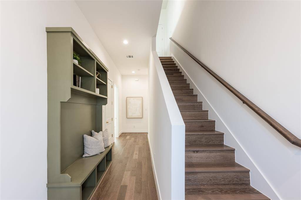 The entryway seamlessly blends style and practicality, offering both storage and striking design.