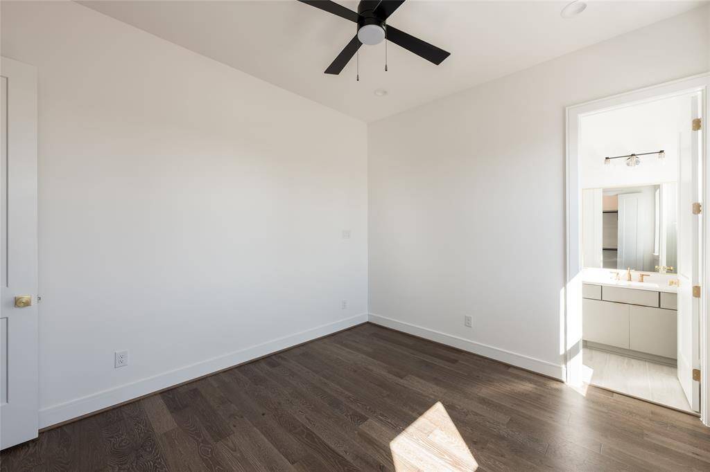 High ceilings and minimalist detailing contribute to the open and inviting feel of these bedrooms.