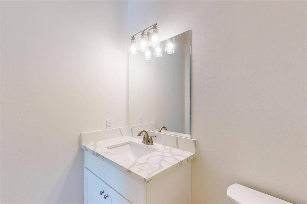 Secondary Bedroom #3, located upstairs with an en suite full bathroom.