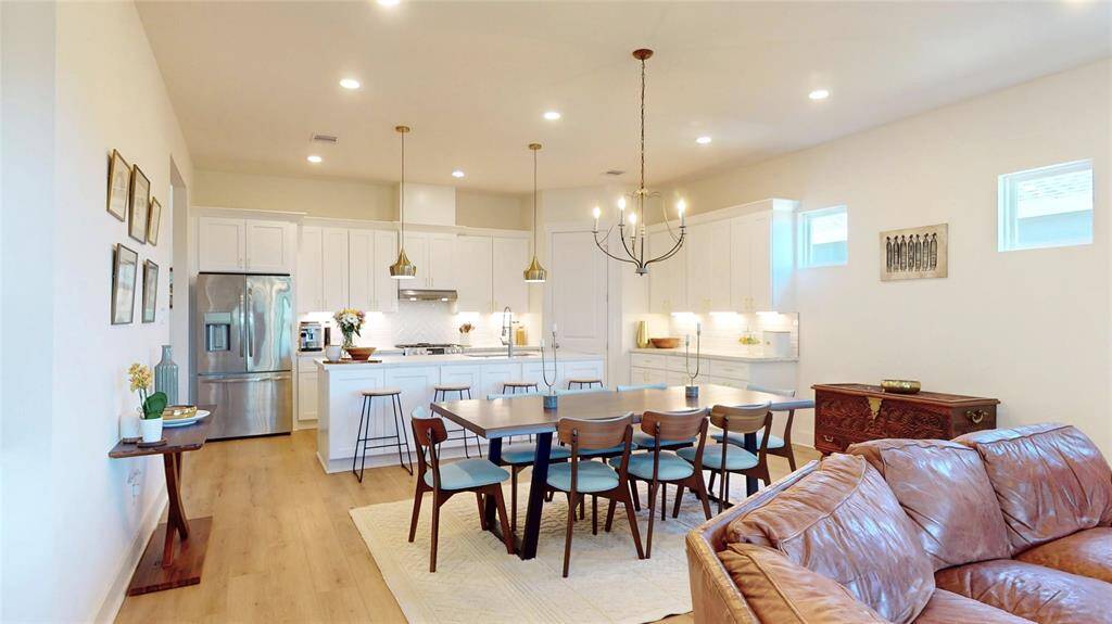 Designated dining room space, with sit at island for additional seating.