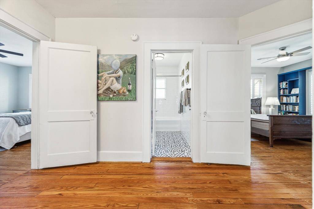 The hall bath is shared between the two bedroom.