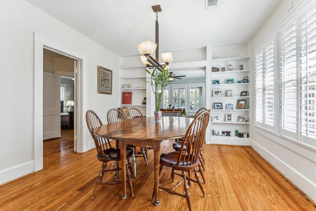A generous dining area seamlessly connects to the living room, ideal for entertaining or cozy weeknight dinners.