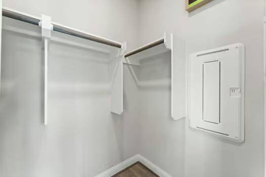 Walk-in Closet located in Primary Bath.