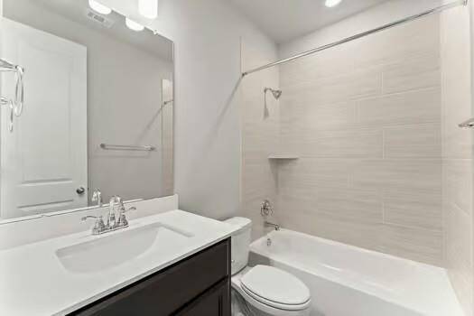 The second and third bedrooms share a well-appointed full bath, offering convenience and functionality with thoughtful layout and modern finishes.