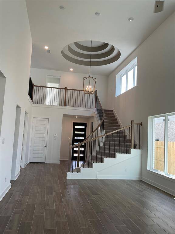 Discover the charm of high ceilings and abundant natural light in this beautiful home.