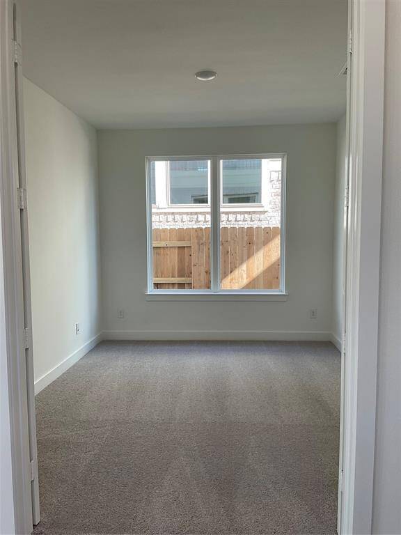 This beautiful home features a versatile flex room downstairs, ideal for a home office or cozy TV room, offering both comfort and functionality.