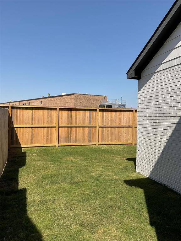 Secure and private backyard, perfect for relaxation and play.