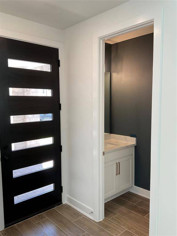 Convenient downstairs half bath for guests and family.