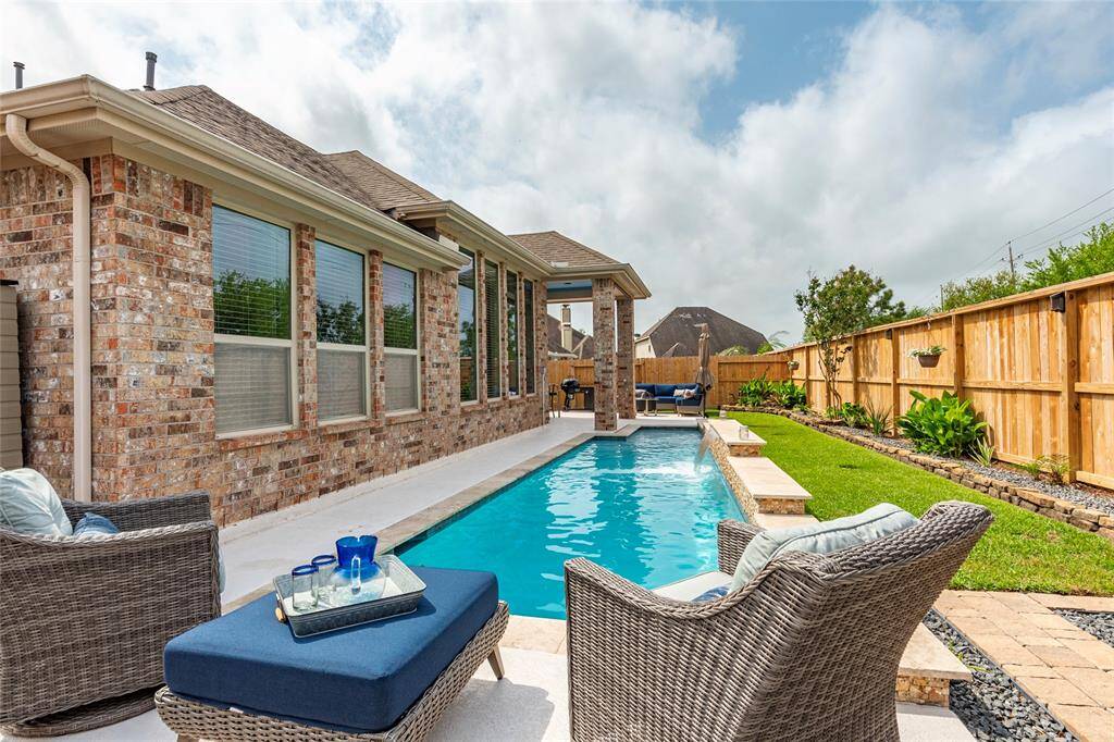Just in time for Summer!  6’ deep swimming pool with tanning ledge, water features, Pentair components, Spray Deck, recent Maytronics Dolphin and Sta-Rite U-3 Skimmer for the pool. Private backyard with no back neighbors; the backyard and pool are in perfect-position, providing evening shade and morning sunlight.