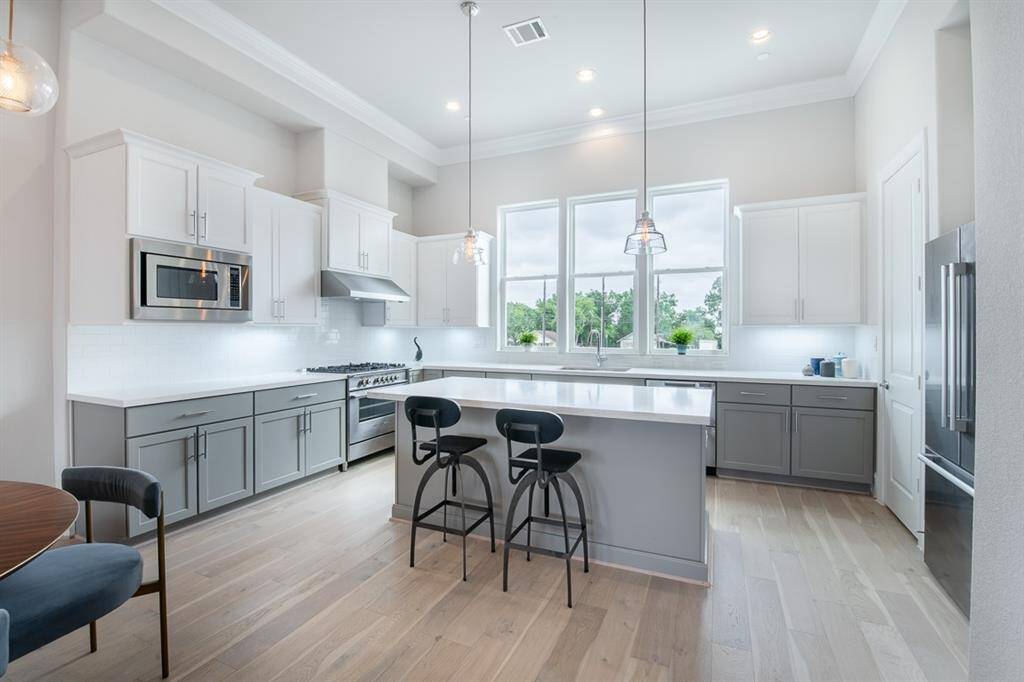 Huge windows everywhere! If you like light, this home is for you!Similar plan and finishes.