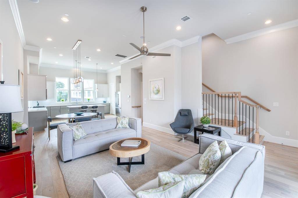 Tall Ceilings and lots of natural light. Actual home has windows all down the side on the left and across the front. Similar plan and finishes.