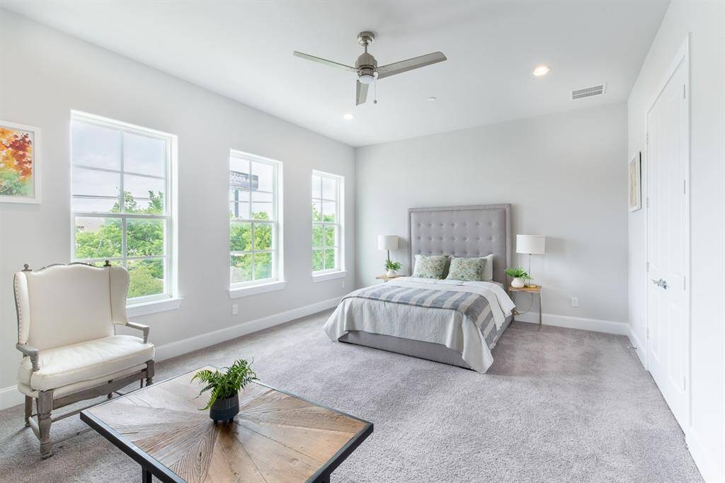 No carpet in the actual home. Instead of 3 windows, there is a window and a glass door that lead out to the open terrace for your get away! Similar plan and finishes.