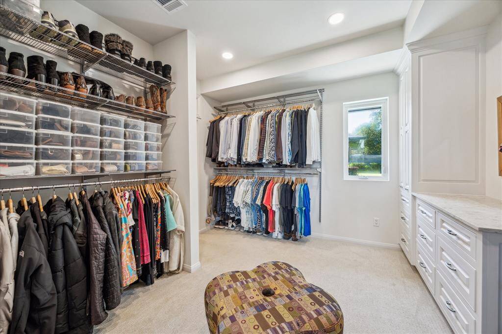 On the other side of the large master bath is the large master closet with plenty of closet space for everyone.
