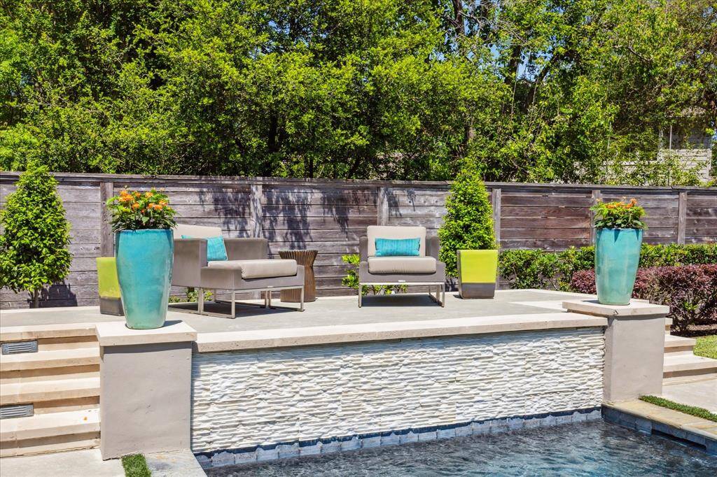 A view of the sundeck and waterfall.