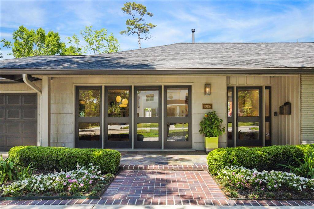 The front patio allows plenty of natural light into the foyer.