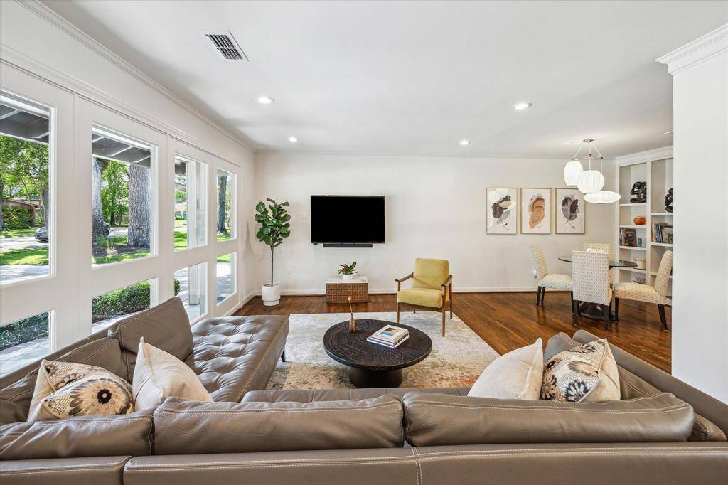 This is just one of two living spaces and a bonus area used as an extra dining area.