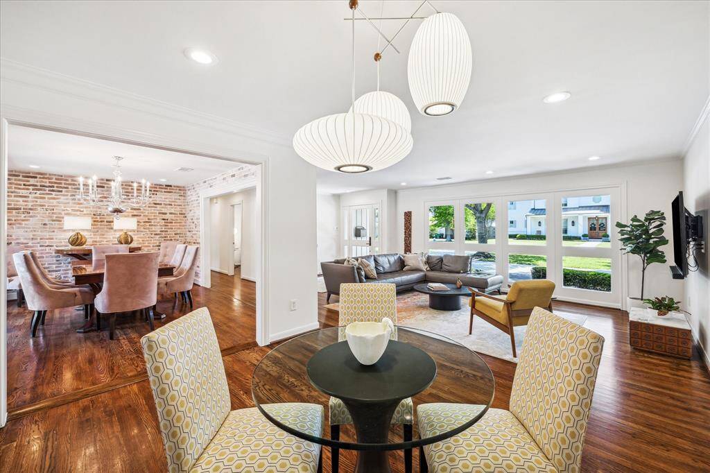 A view from the secondary sitting area showing the wonderful dining area and front living space.
