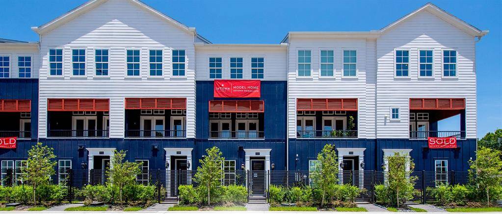 Great architecture with high pitched roofs, pediments and louvers. Layers of lush landscaping.