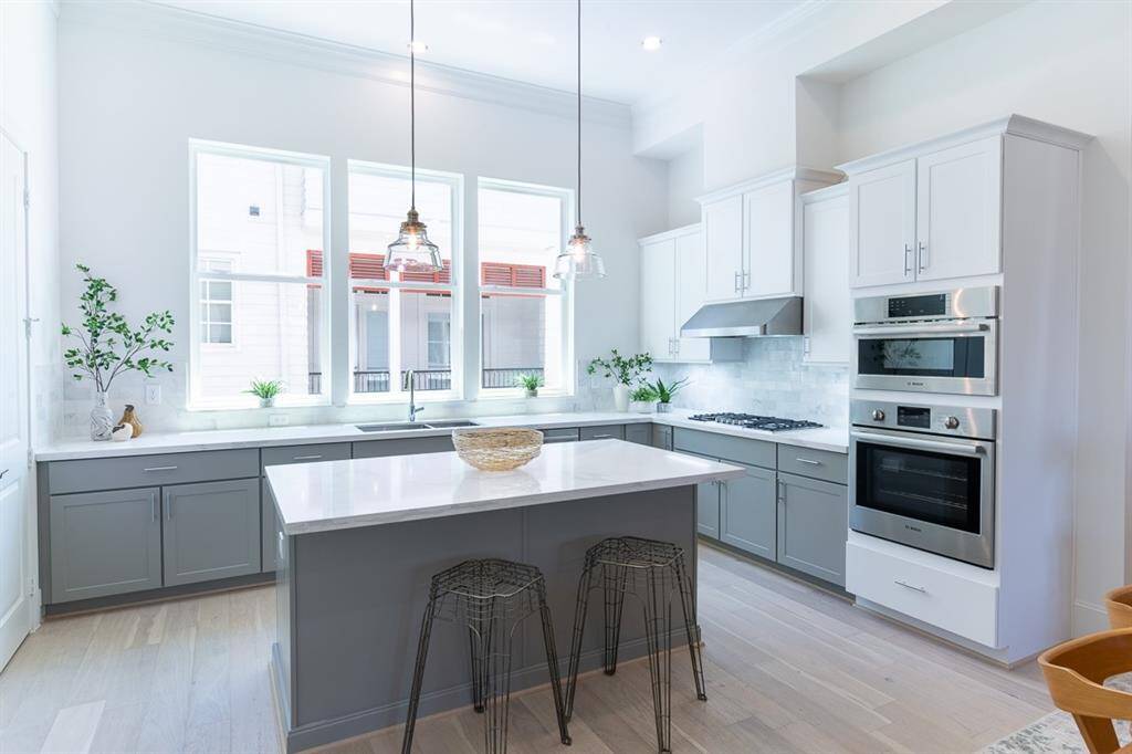 Similar home/ floor plan. Actual has more contrast in cabinets creating a tuxedo look!