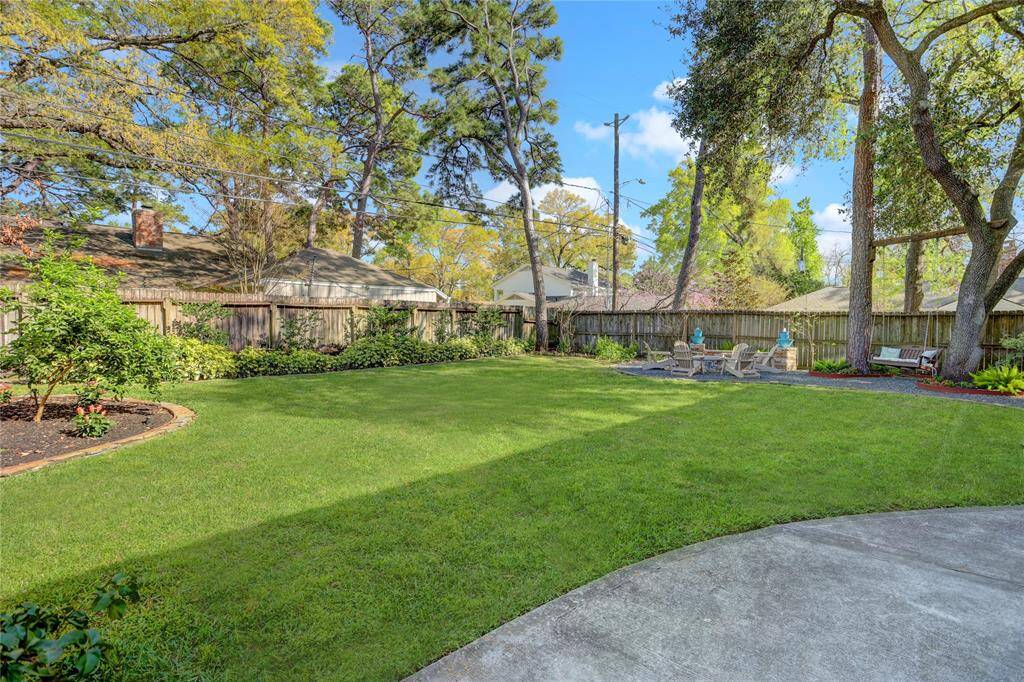 Thoughtful landscaping completes this serene backyard and solidifies this as your next new home!