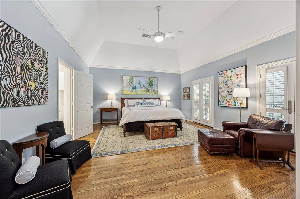 Welcome to your primary retreat with vaulted ceilings, spa-like bathroom, and ensuite home office.