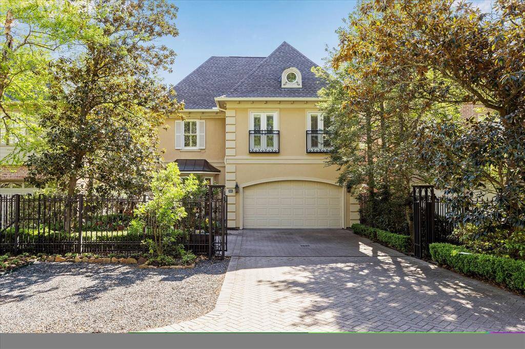 A rare find in Tanglewood, this home has two parking spots on the street, and an extra parking spot inside the driveway gate.